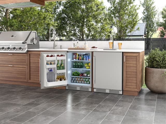 Credit: Zephyr Front view of an outdoor patio with opened mini refrigerators