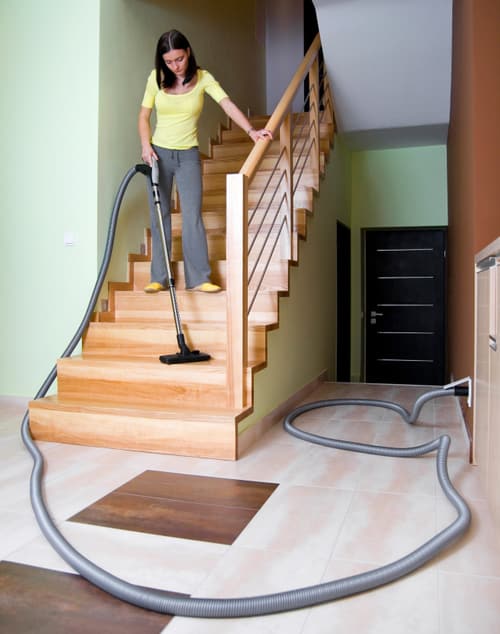 Using a central vacuum retractable hose system Using a central vacuum retractable hose system