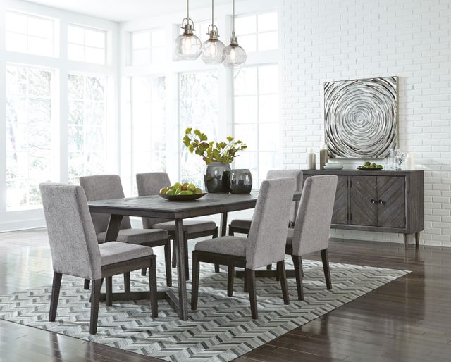 Credit: Ashley Front view of a modern dining room with a contemporary table and chairs