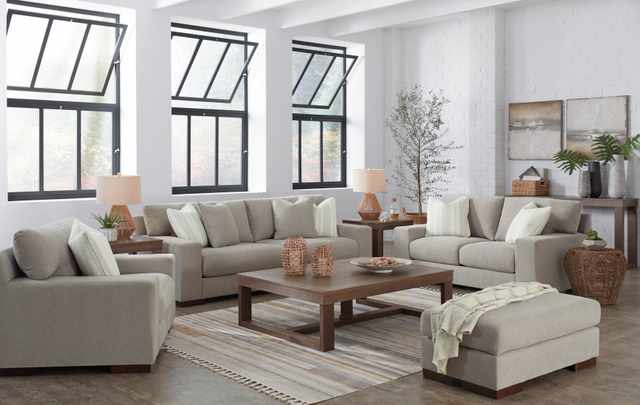Credit: Ashley Furniture Front view of a modern living room with Ashley furniture