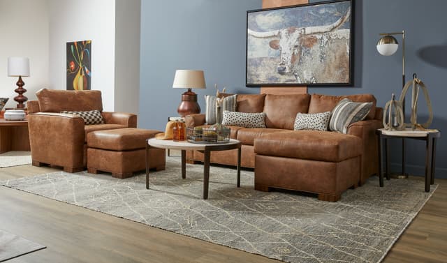 Credit: Flexsteel Front view of a modern living room with a leather sofa and oversized chair