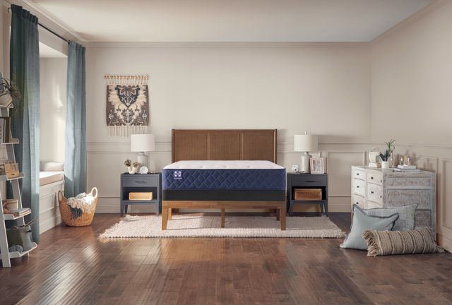 Credit: Sealy Front view of a modern bedroom with a Sealy queen mattress