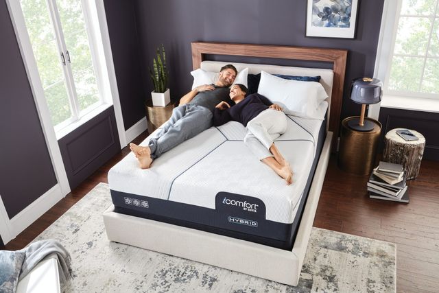 Front view of a modern bedroom with a Serta mattress