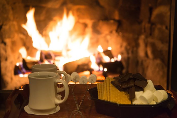 homemade s’mores in front of a living room fireplace