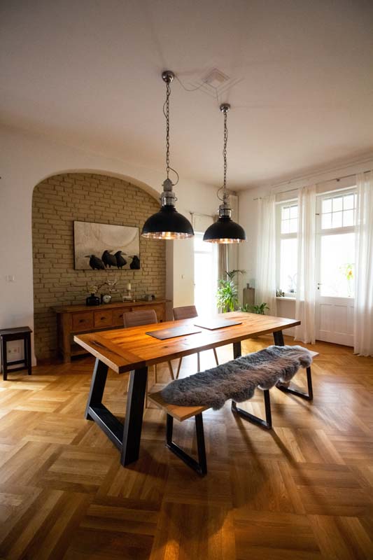 cozy bench by windows with lots of natural light