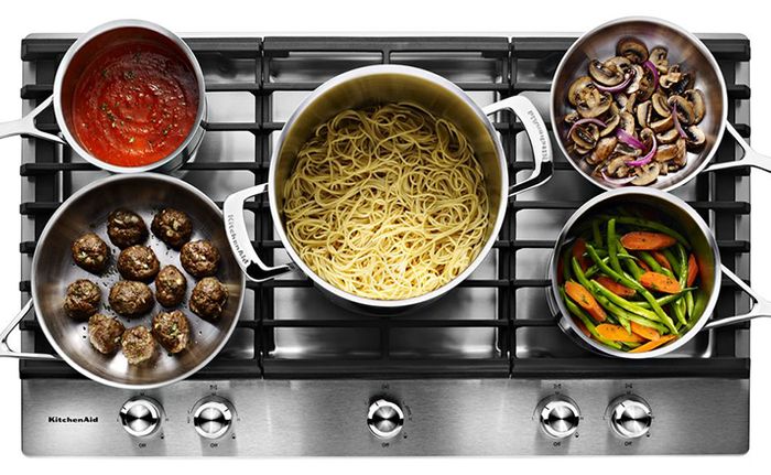 The KitchenAid Five Burner Cooktop is on Fire