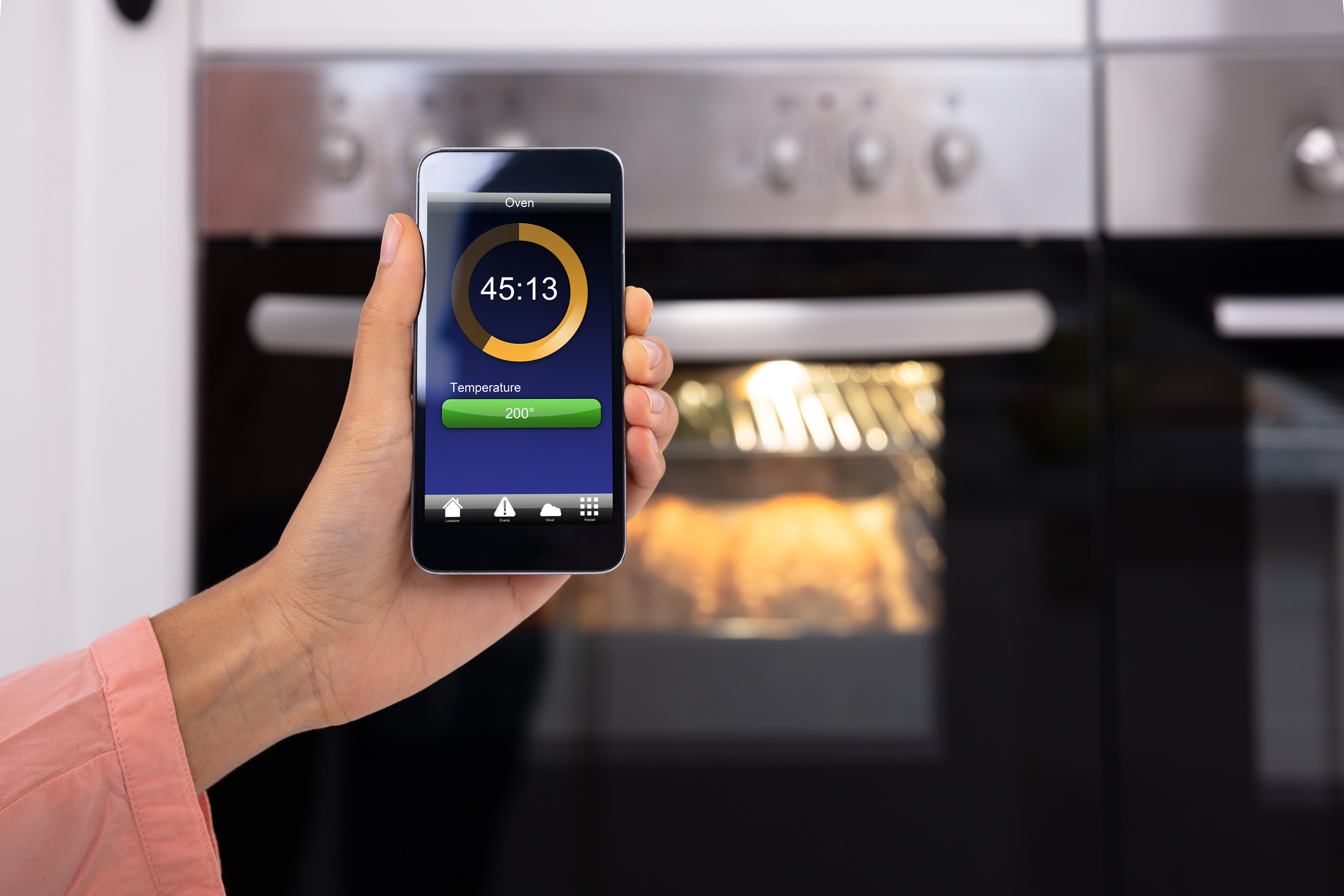 checking on dinner from smartphone 