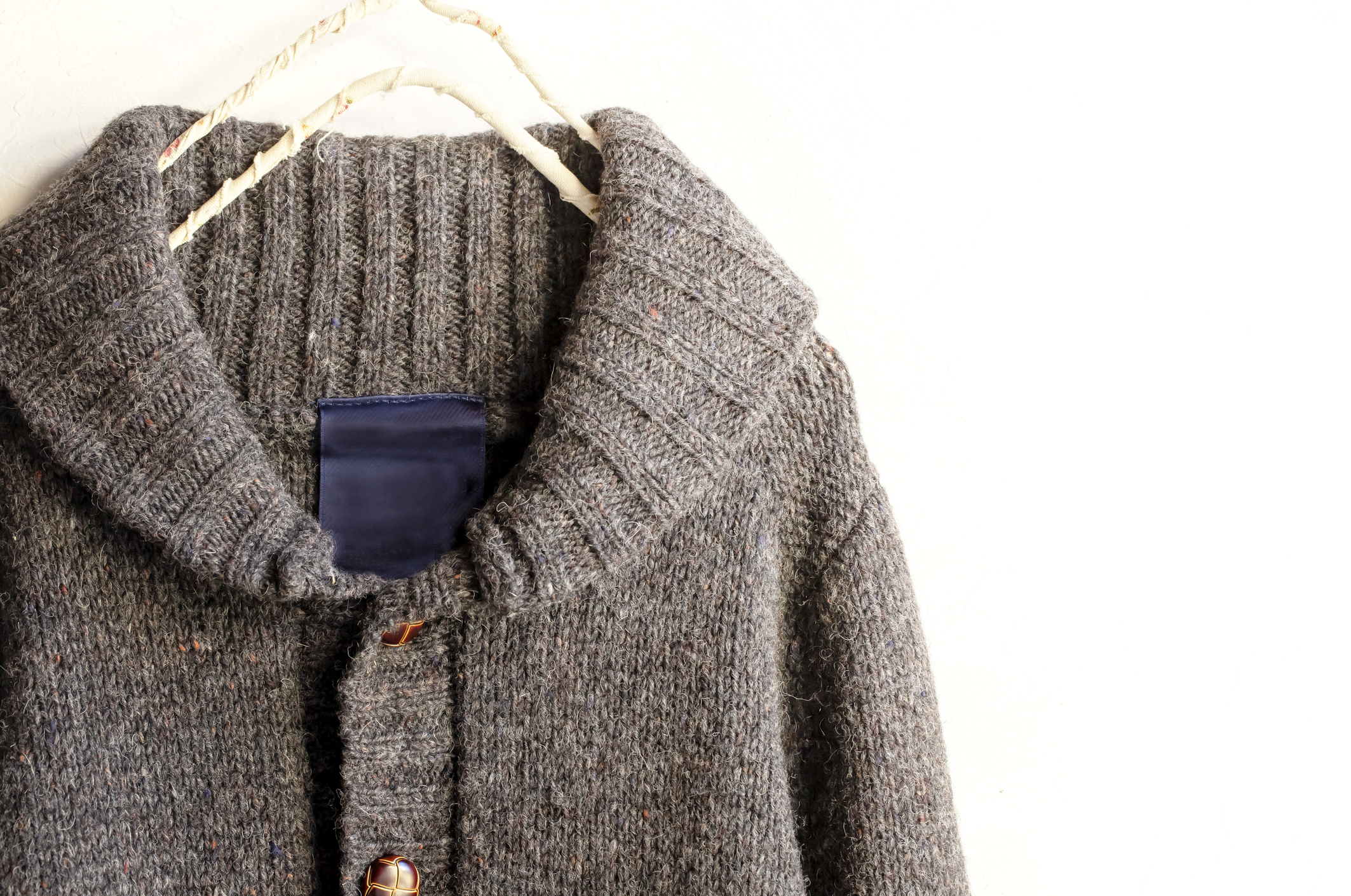 wool coat on a coat hanger