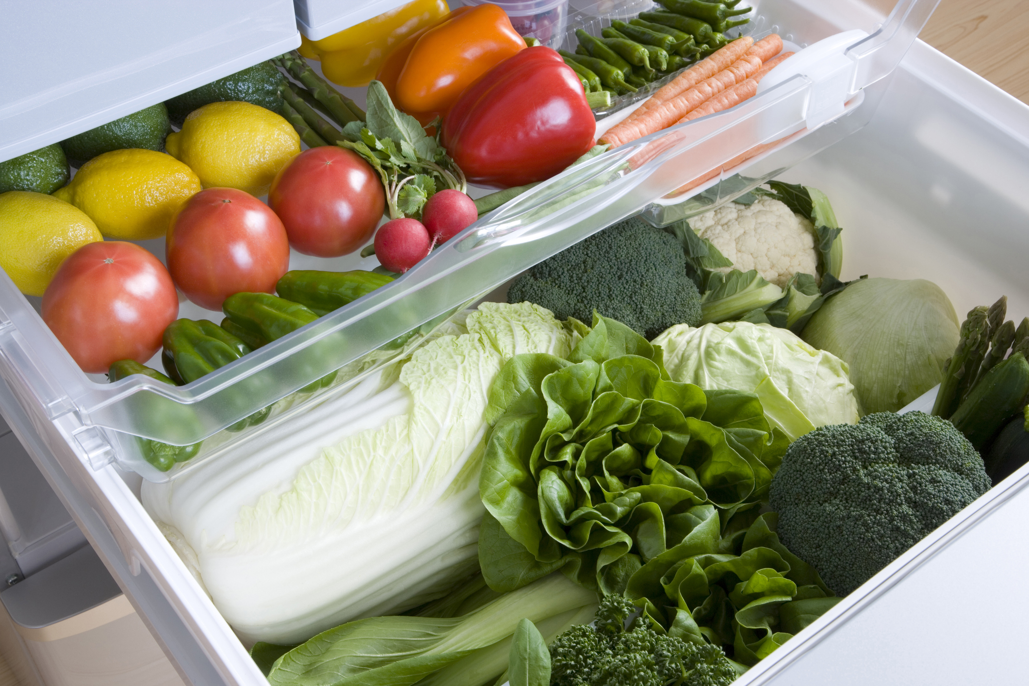 fridge drawers with fruits and veggies