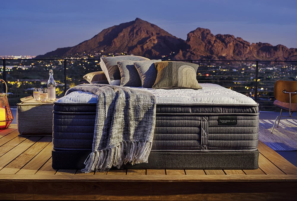 King Koil bed with mountain range background