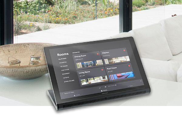 IC Realtime home security screen shown on a tablet on the counter in a living room