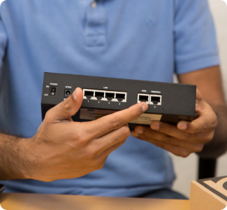 Man Holding A Router