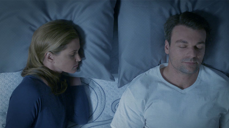 couple sleeping in bed