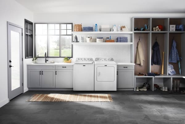 ndry Room Featuring a Maytag 7.0 Cu. Ft. White Front Load Gas Dryer and Washer