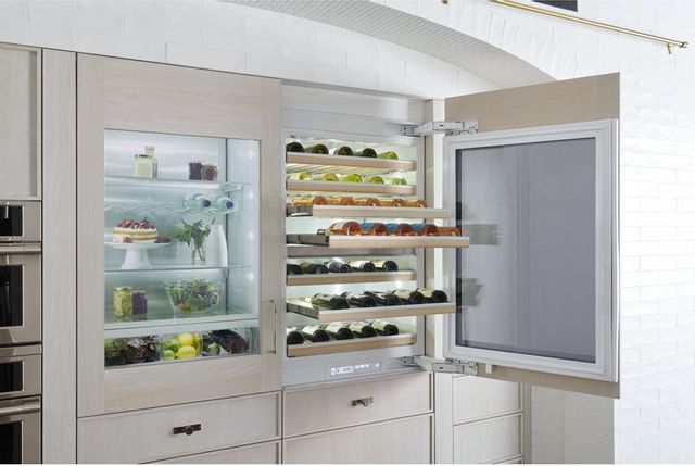 Monogram 30” built-in wine sommelier show with a full stock of wines 