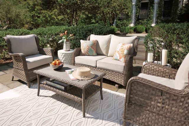 Signature Design by Ashley® Clear Ridge Light Brown Outdoor Glider Loveseat, 2 Chairs, and Cocktail Table-1