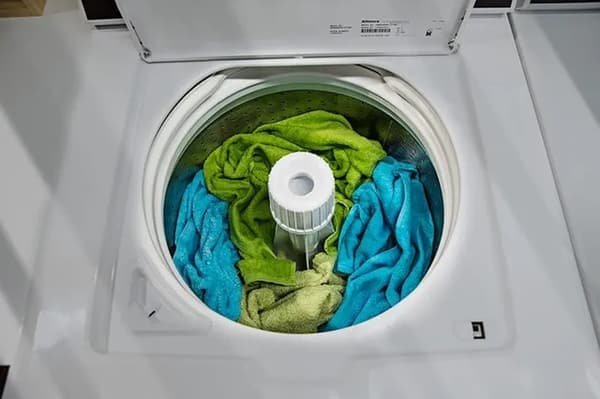 Speed Queen TC5 White Top Load Washer Loaded with Laundry