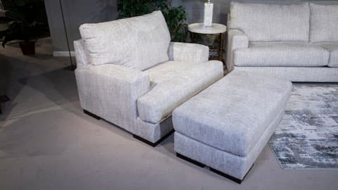 Signature Design by Ashley® Caretti Parchment Ottoman-2
