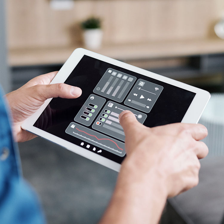 User on tablet using distributed audio app