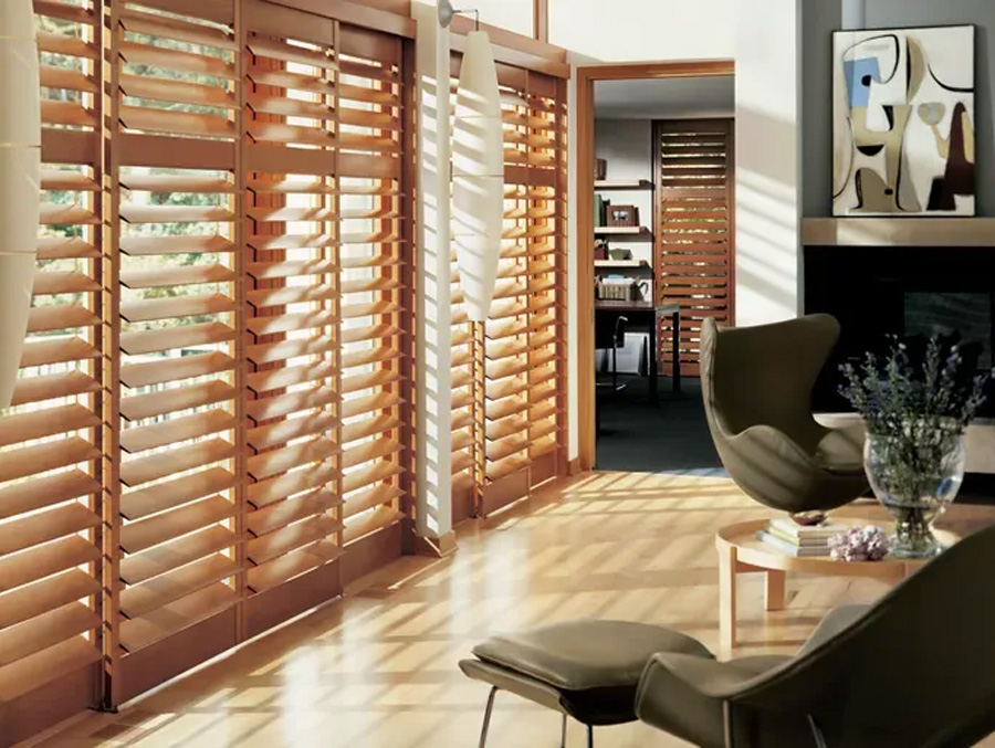 Wood shutters in living room slightly closed