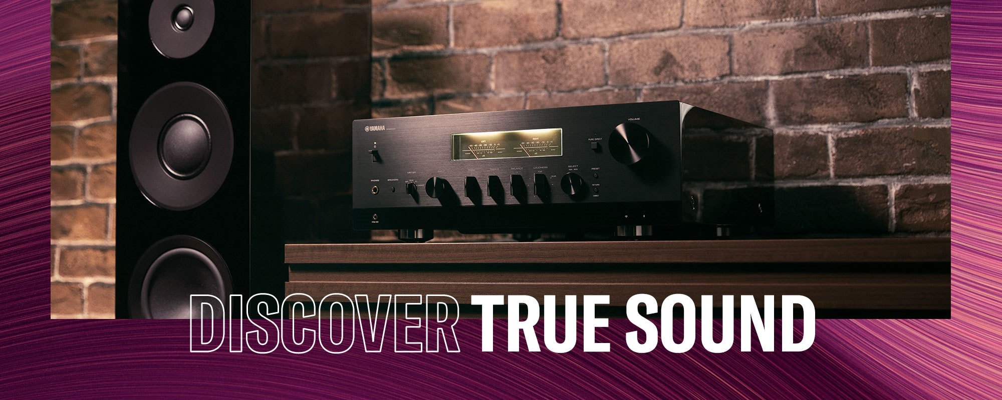 Yamaha - Discover True Sound - Hi-Fi Component on wood table against brick wall