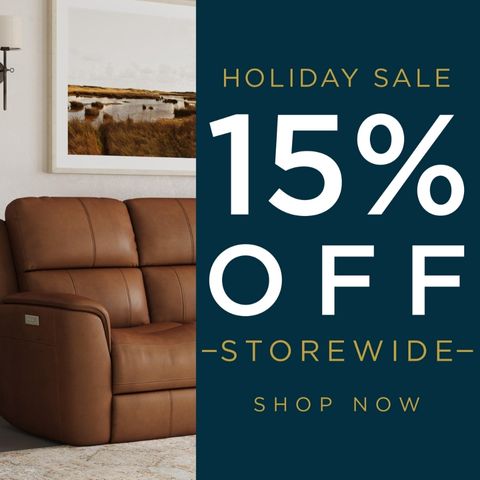 Promotional banner showing a brown leather reclining sofa in a modern living room. Text on the right reads Holiday Sale, 15% Off, Storewide, Shop Now.