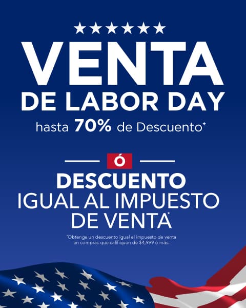 Fondo azul con una fila de estrellas blancas y una bandera estadounidense ondeando en la parte inferior en rojo, blanco y azul. El texto dice VENTA DE LABOR DAY, hasta 70% de Descuento, O, DESCUENTO IGUAL AL IMPUESTO DE VENTA, Obtenga un descuento igual al impuesto de venta en compras que califiquen de $4,999 ó más.