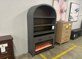 Arch bookcase with fireplace.