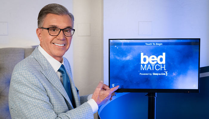 Bob Mills Furniture presenter with the BedMatch sleep assessment screen