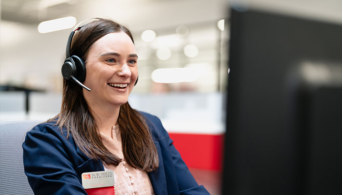 Customer Service representative with a headset on