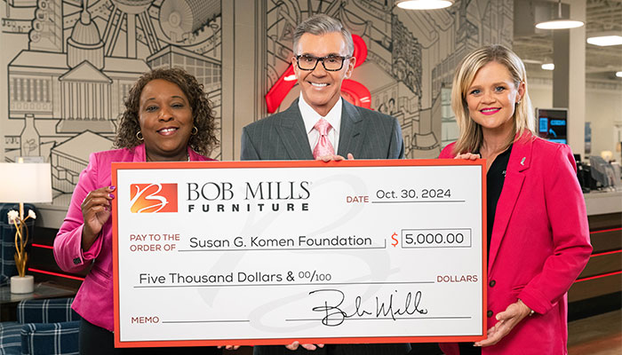 Bob Mills Holding Big Check