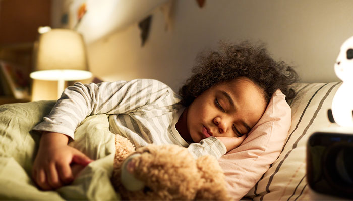 Child sleeping in bed