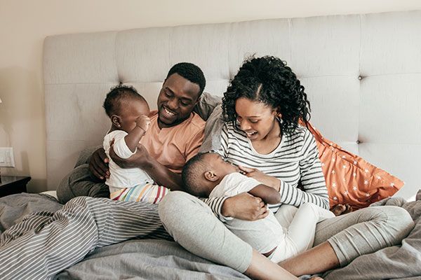 Family in bedroom