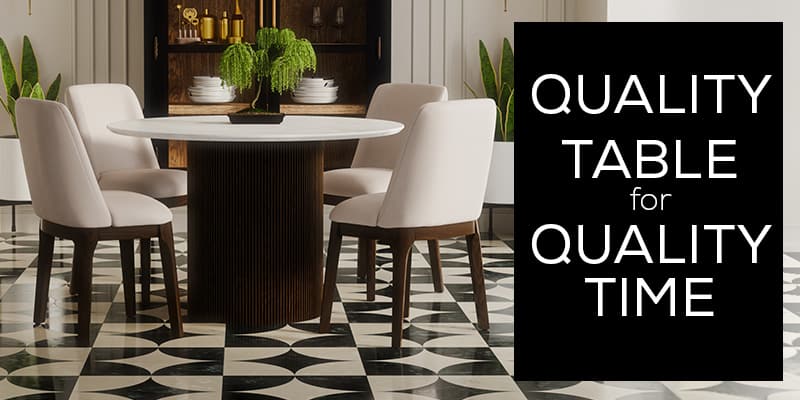 Wood dining table set with upholstered chairs in a bright, modern dining room