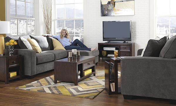 Modern living room with comfortable sectional sofa and entertainment center