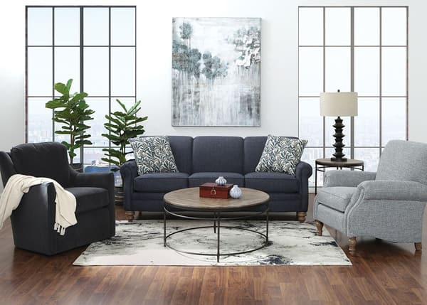 Elegant Smith Brothers living room with leather chair, arched artwork, and traditional coffee table