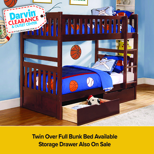 Promotional image showing a light gray upholstered recliner chair on a white background with a visible side lever. A red banner with a blue star at the bottom reads, “BUILT IN ★ AMERICA — Special Order Available.”