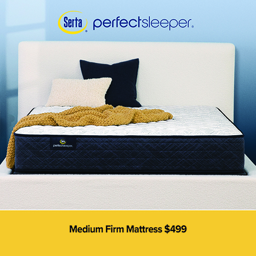 An advertisement for a Serta Perfect Sleeper mattress. The mattress features a white patterned top and dark blue quilted sides, shown on a white upholstered bed frame with a yellow knit throw blanket and accent pillows. The Serta Perfect Sleeper logo is at the top against a light blue wall. A yellow banner at the bottom reads: Medium Firm Mattress $499.