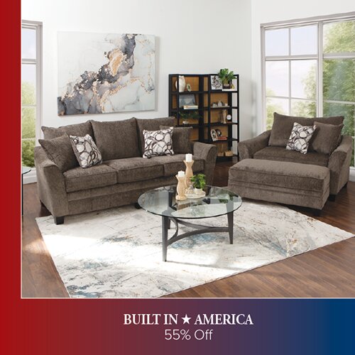 A living room scene featuring a brown fabric sofa, matching armchair, and ottoman. The room includes a round glass coffee table, abstract wall art, and a black bookshelf. The bottom banner reads 'BUILT IN AMERICA' and '55% Off'.