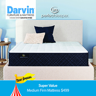 A promotional advertisement for Darvin Furniture & Mattress featuring a mattress sale. The graphic showcases a Serta Perfect Sleeper mattress with a quilted white top and a dark charcoal grey crosshatch-patterned side panel. The mattress rests on an upholstered off-white bed frame with a matching tall headboard against a light blue wall, styled with a dark blue pillow and a smaller textured cream pillow. The top left corner features the blue and black Darvin Furniture & Mattress logo with the text 'Chicago Grown Employee Owned', and the Serta Perfect Sleeper logo is positioned to its right. A yellow 'Tent Special' flag and the top of a red-and-white striped circus tent appear in the bottom left. A solid blue banner along the bottom reads 'Super Value' followed by 'Medium Firm Mattress $499' in clean white text.