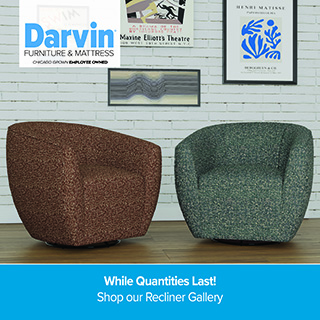 A promotional advertisement for Darvin Furniture & Mattress featuring accent chairs. The image displays two modern, rounded barrel-style swivel chairs side-by-side on a hardwood floor against a white brick wall. The chair on the left is upholstered in a textured, multi-tonal brown fabric, while the chair on the right is upholstered in a textured, mottled green and cream fabric. The wall behind them is decorated with framed art pieces, including a blue Henri Matisse print on the upper right. The top left corner features the blue and black Darvin Furniture & Mattress logo with the text 'Chicago Grown Employee Owned'. A solid blue banner along the bottom reads 'While Quantities Last!' followed by 'Shop our Recliner Gallery' in clean white text.