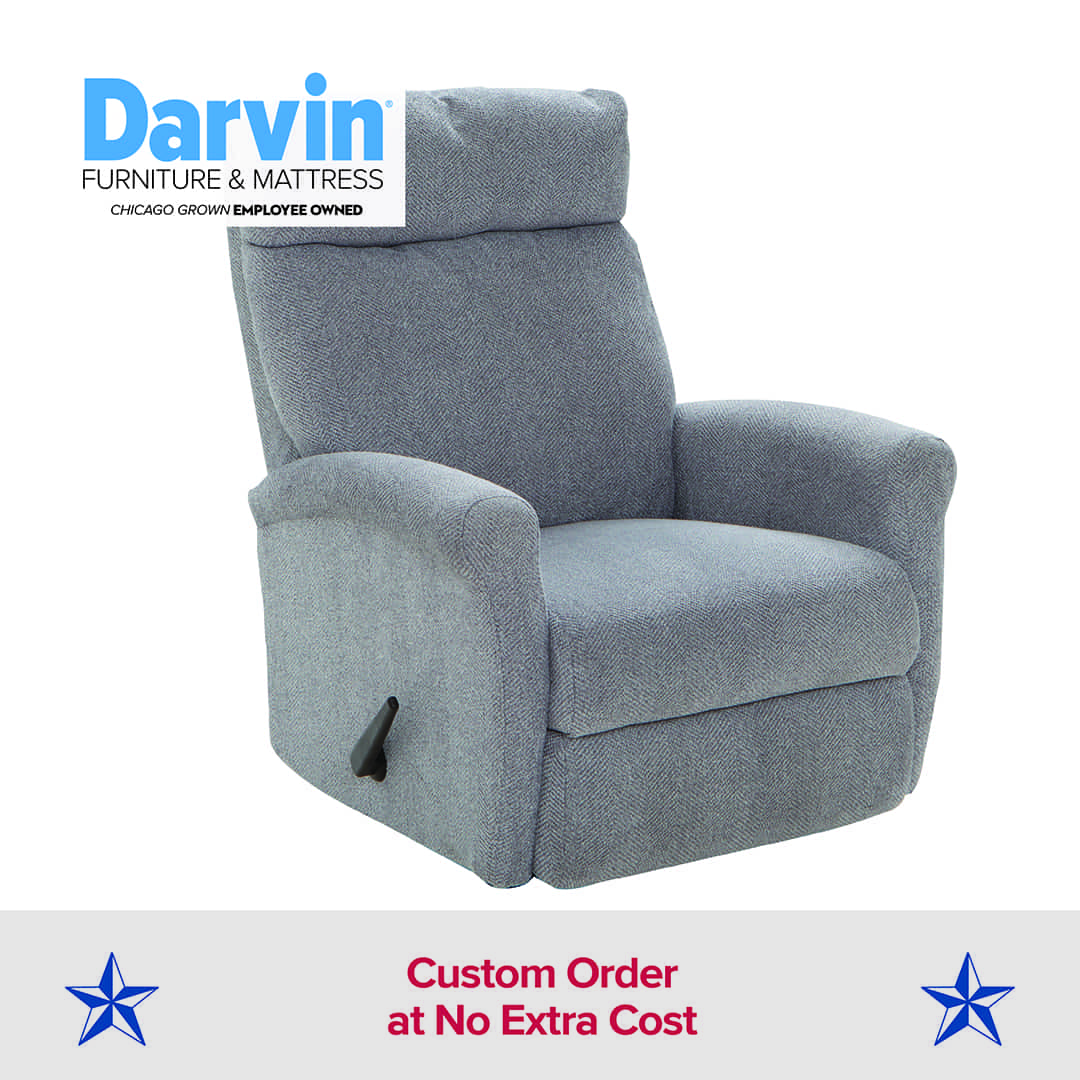 Light grey fabric recliner with a lever handle on the side, shown against a white background. Text reads: “Darvin Furniture & Mattress – Chicago Grown Employee Owned – Custom Order at No Extra Cost,” with blue stars on each side.'