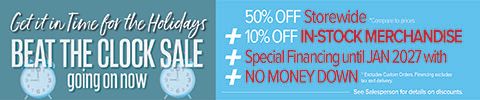 A wide promotional banner with a teal background featuring several sales messages. On the left, white script text reads Get it in Time for the Holidays, followed by large bold text: Beat the Clock Sale going on now. To the right, large white numbers state 50% OFF STOREWIDE, with smaller text noting *Compare to Price. Farther right, large white text reads 10% OFF IN-STOCK MERCHANDISE. Blue alarm-clock graphics appear behind the percentage symbols. On the far right, bold red text announces NO INTEREST IF PAID IN FULL BY JANUARY 2027†” and “NO MONEY DOWN††, along with fine-print details noting exclusions and that customers pay sales tax and delivery charges at purchase.