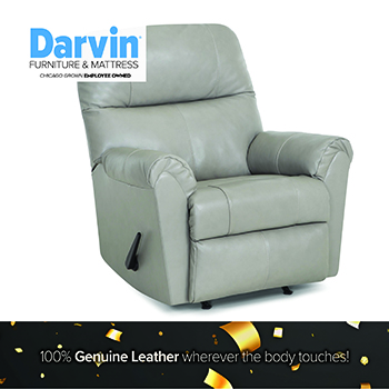 Promotional image of a plush blue fabric recliner chair with padded armrests and a tall, cushioned back. The Darvin Furniture & Mattress logo appears in the top left. A small inset image shows the recliner in a fully reclined position. Text along the bottom reads, Custom Order Available.