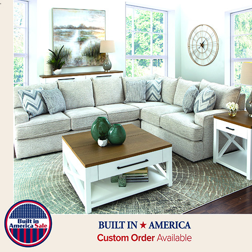 Light-colored L-shaped sectional sofa with coordinated pillows in a bright living room, arranged as a two-piece seating configuration