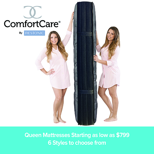 A promotional advertisement for ComfortCare by Restonic mattresses. The image features two smiling women wearing identical light pink button-down shirt dresses, standing on a white background and holding a thick, dark grey or black queen-size mattress upright between them. The ComfortCare by Restonic logo is displayed in the upper-left corner. A solid teal banner along the bottom reads 'Queen Mattresses Starting as low as $799' followed by '6 Styles to choose from' in clean white text.