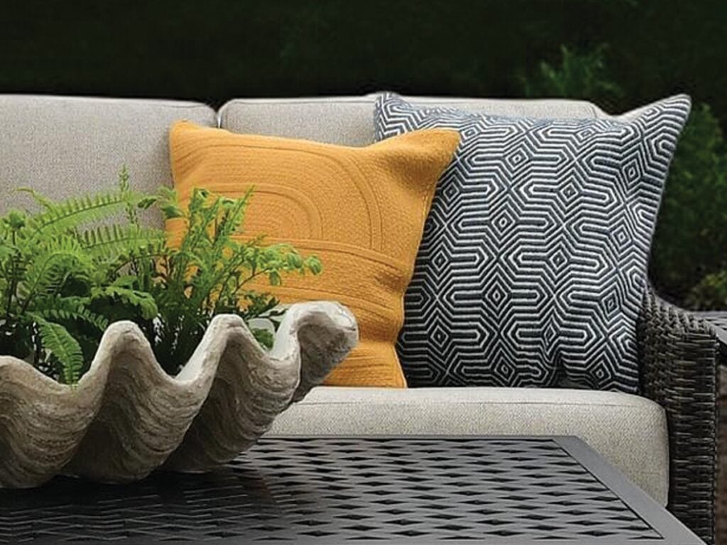Outdoor throw pillows on patio sofa