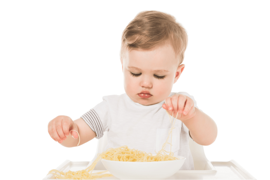 baby eating at a highchair