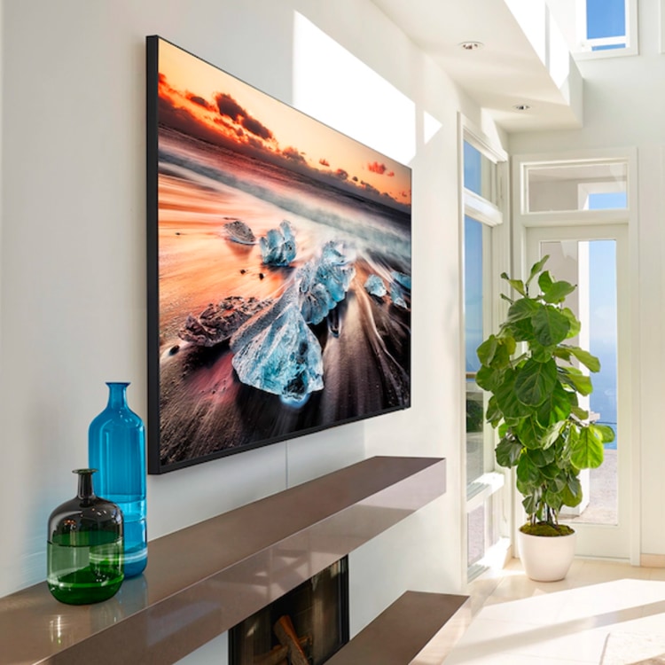 Samsung OLED flat screen tv hanging in living room