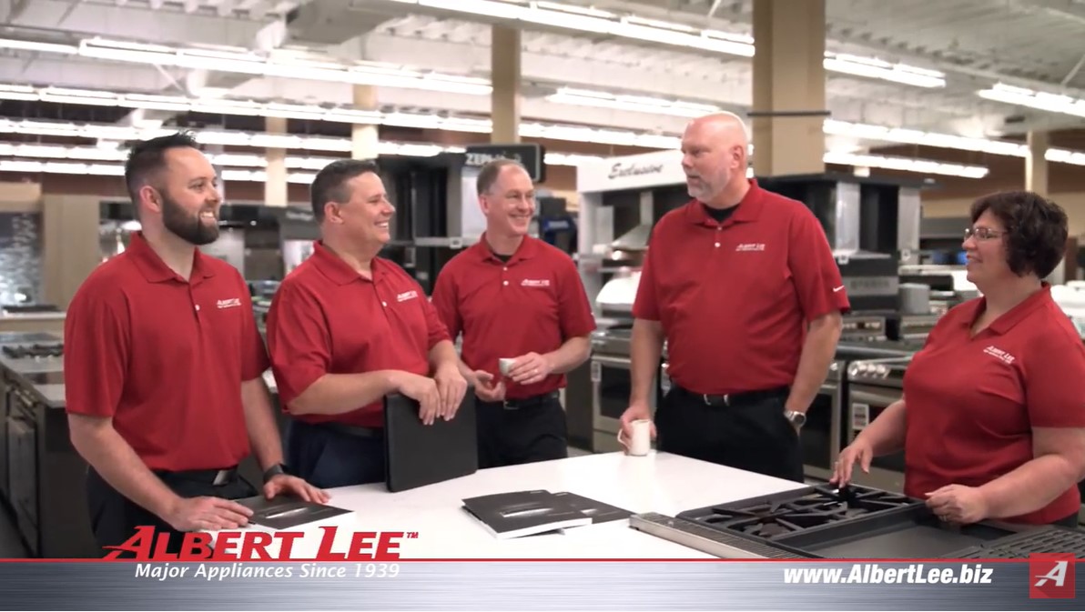 Team members posing for Albert Lee Appliancde